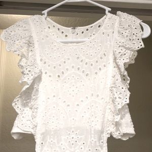 White eyelet jumpsuit with cute cutouts. Size M